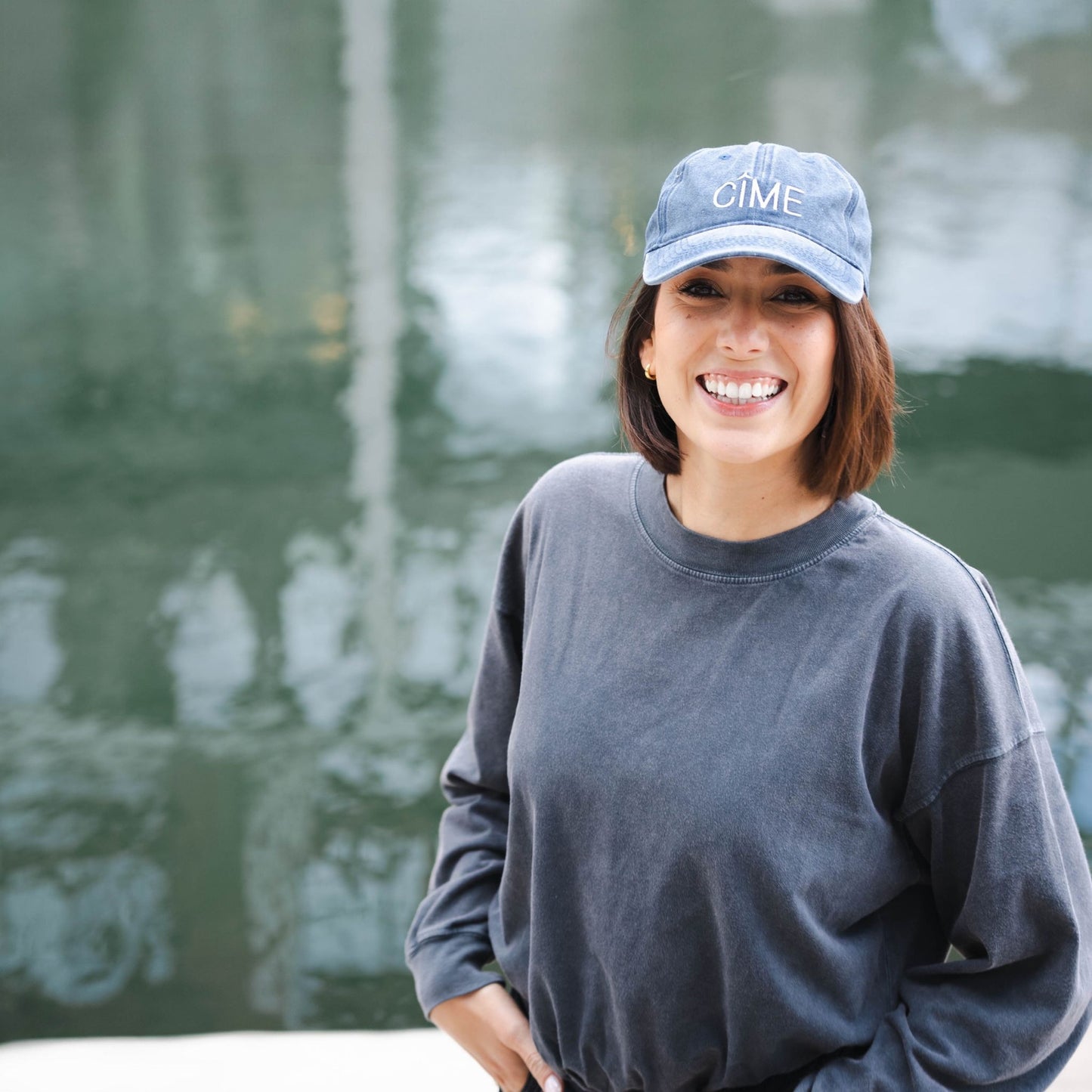 Woman with CÎME cap