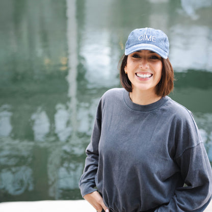 Woman with CÎME cap