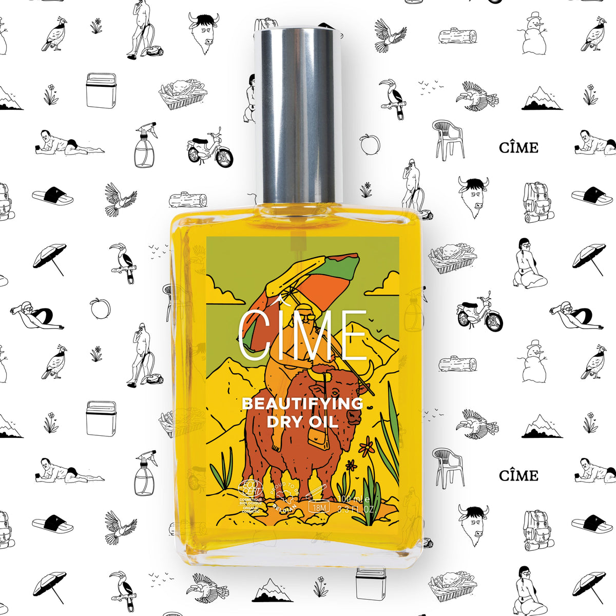 CÎME Beautifying Dry Oil met MAT-cadeaupapier op de achtergrond