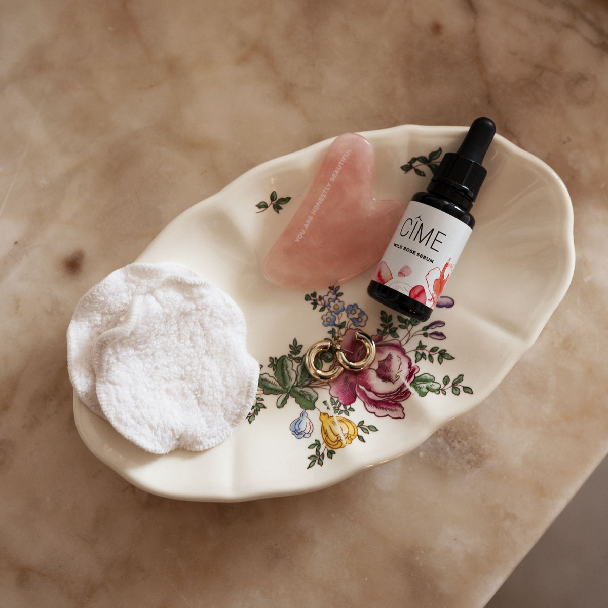 CÎME Gua Sha steen met Wild Rose Serum
